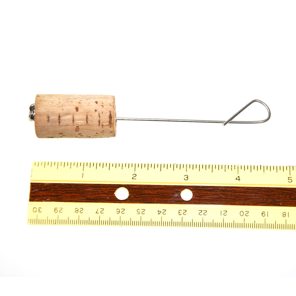 Small Guides Choice Fish Release tool shown beside a ruler on a white background