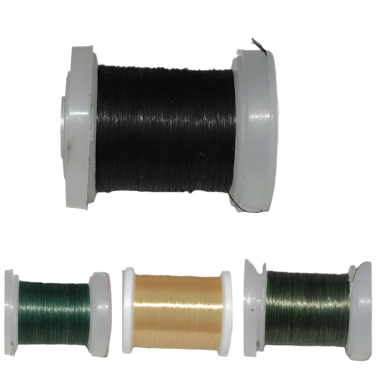 Kevlar fly tying thread show in four colors on a white background