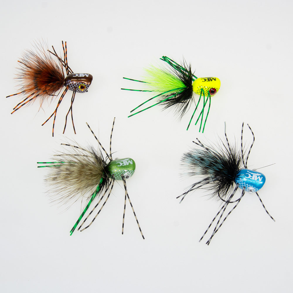 Bombshell Popper in Chartreuse,  Bronze, Damsel Blue, and Damsel Olive which are excellent topwater fly for smallmouth bass