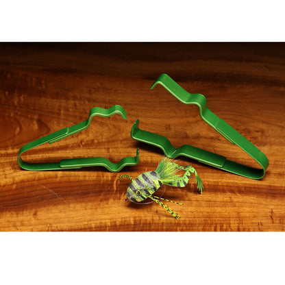 Cohen's Original Fugly Deer Hair Packer shown with a Deer Hair Frog on a table
