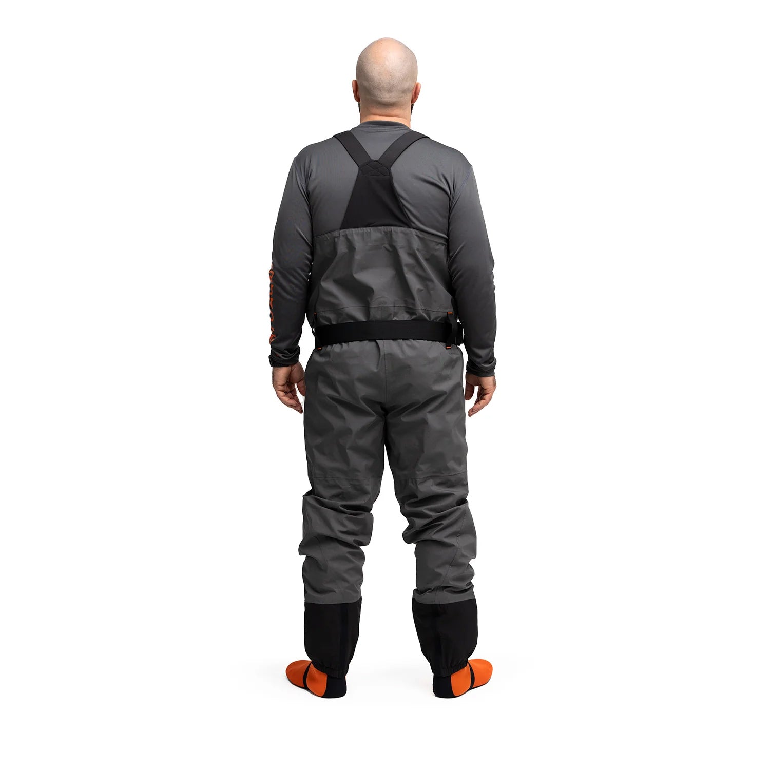 Grundens Vector Stockingfoot waders shown from the back worn on a man