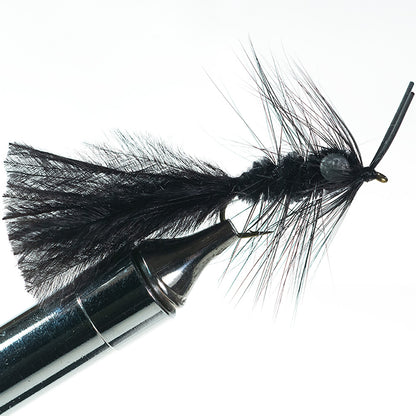 Black Murray’s Hellgrammite fly, providing a high-contrast silhouette for smallmouth bass in stained or murky water.