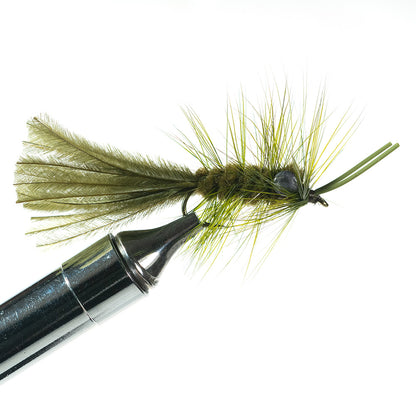 Olive Murray’s Hellgrammite fly pattern, ideal for clear water conditions and matching natural riverbed vegetation.