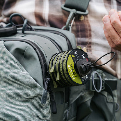 LINK™ Tippet Tower showing vertical magnetic stack holding up to five tippet spools mounted on a LINK™ Base Station.