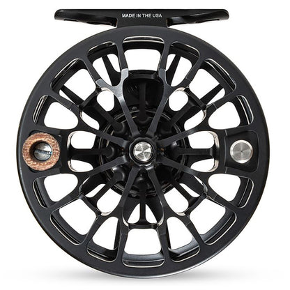 Ross Animas Reel--Matte black, front view showing the reel handle and the imprint of Made In The USA on the reel foot