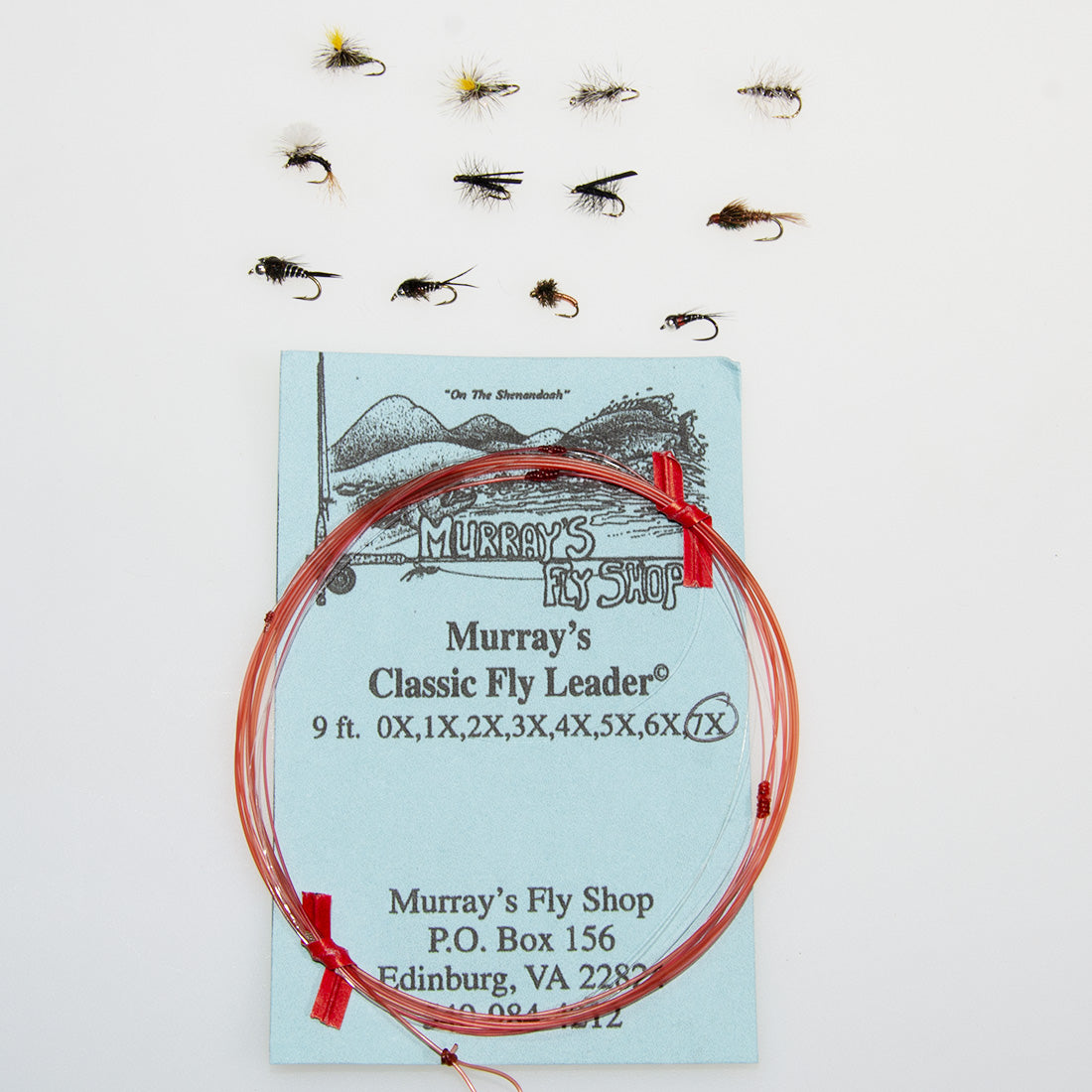 an assortment of dry flies and nymphs that are recommended for midge fly fishing to selective trout in low water at the end of the summer