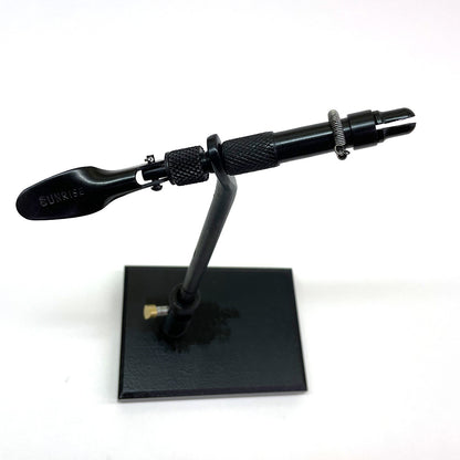 Close-up of  Super AA fly tying vise head showing knurled adjustment knobs, cam jaw, and bobbin cradle on pedestal base