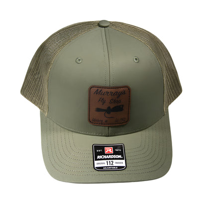 Loden Richardson 112 Cap on a white background with a leather popping bug patch