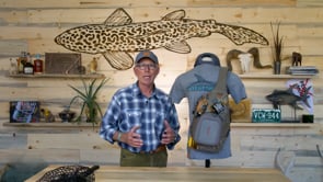 Fishpond founder Johnny LeCoq showing the features of the Fishpond Summit Sling Pack in a video 