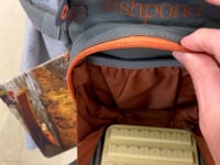 Shown is the Fishpond Canyon Creek Chest Pack in a video created by Murray's Fly Shop showing the inside features of the pack