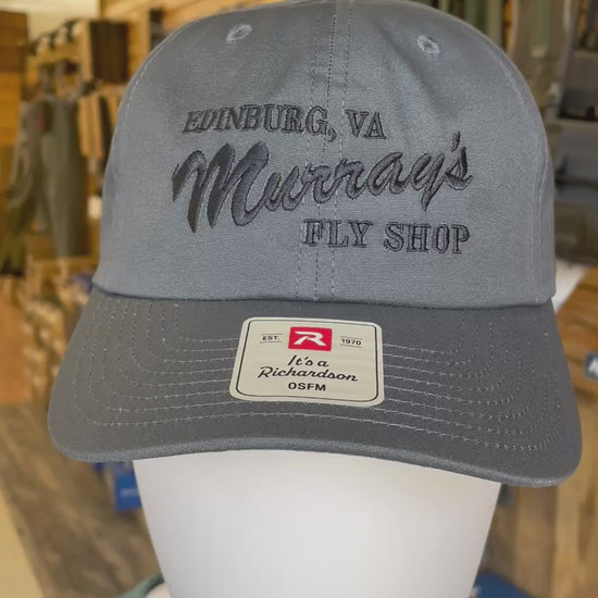 video displaying the Richardson 262 hat in pacific blue with Murray's Fly Shop name embroidered on the front