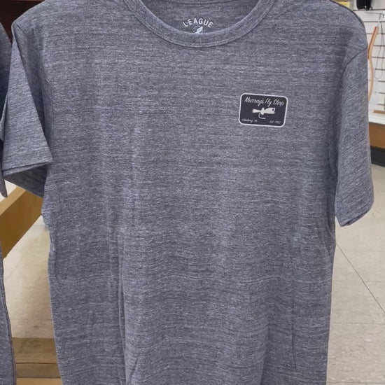 video of Murray's Bass Graphic T-Shirts displaying a bass and fly rod on the back. Available in two colors.