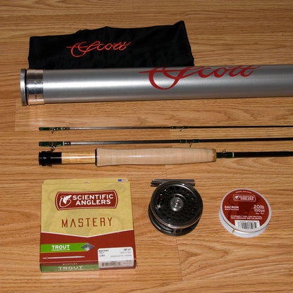 Close-up of the cork handle on a Murray's Mountain Trout fly rod featuring a Hardy Marquis LWT 4 reel and Scientific Anglers fly line.