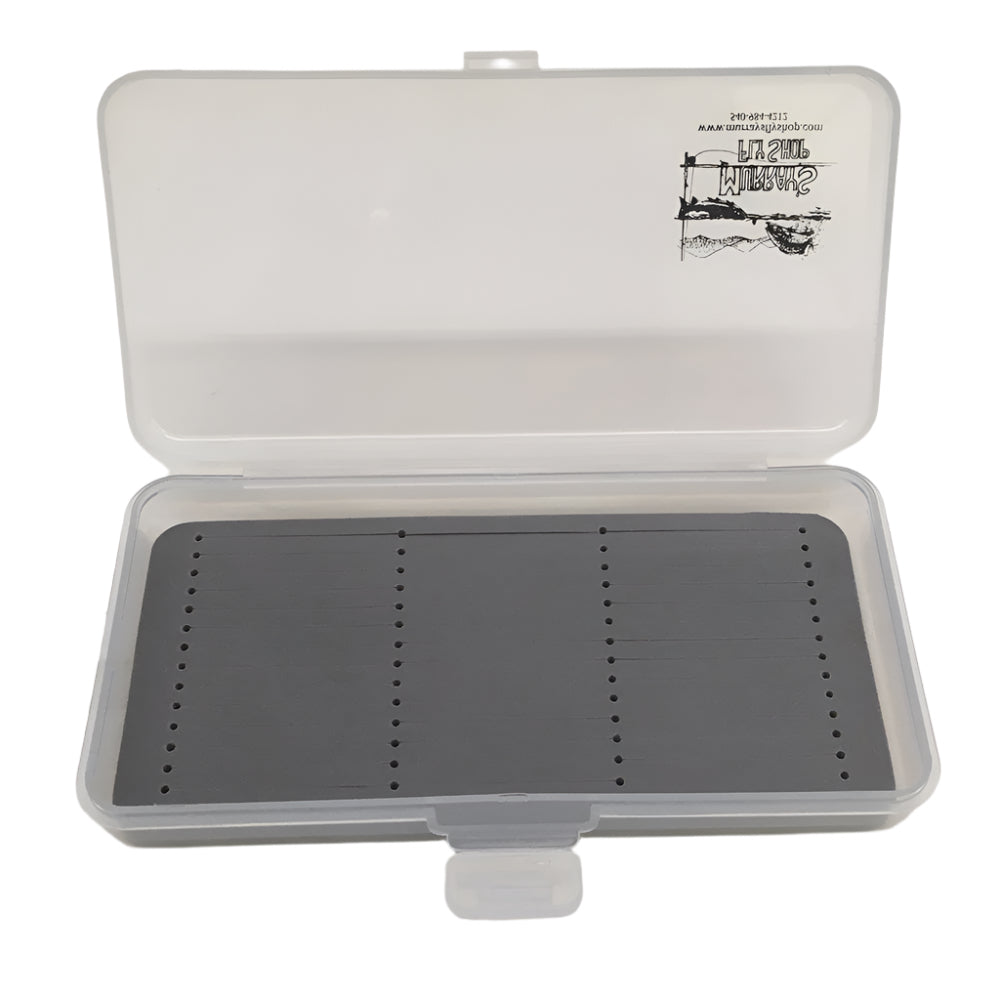 Shown is a clear plastic box with a gray slit foam insert for holding flies.  The box has a Murray's Fly Shop logo on the lid in the lower right hand corner