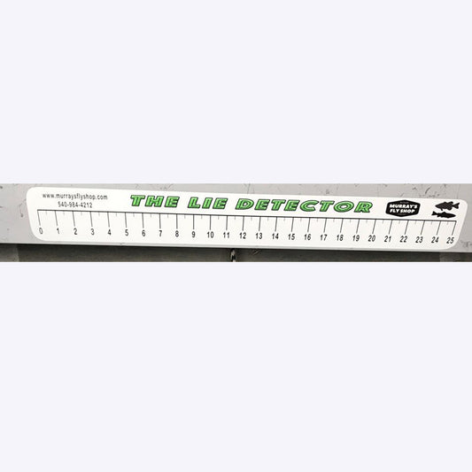Lie Detector Sticker shown on a fishing boat box this is a ruler that measures up to 25 inches