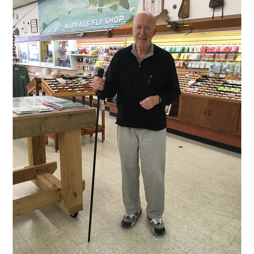 Harry Murray poses with the Murray's Fly Shop Collapsible wading staff in it's extended and locked position