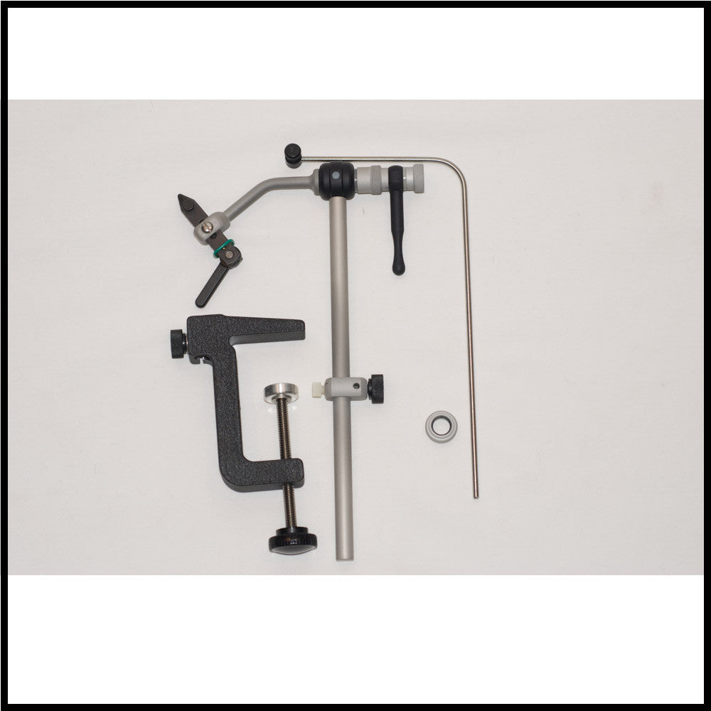 Renzetti Traveler C-Clamp Fly Tying Vise with bobbin cradle is pictured disassembled on with background - Murray's Fly Shop