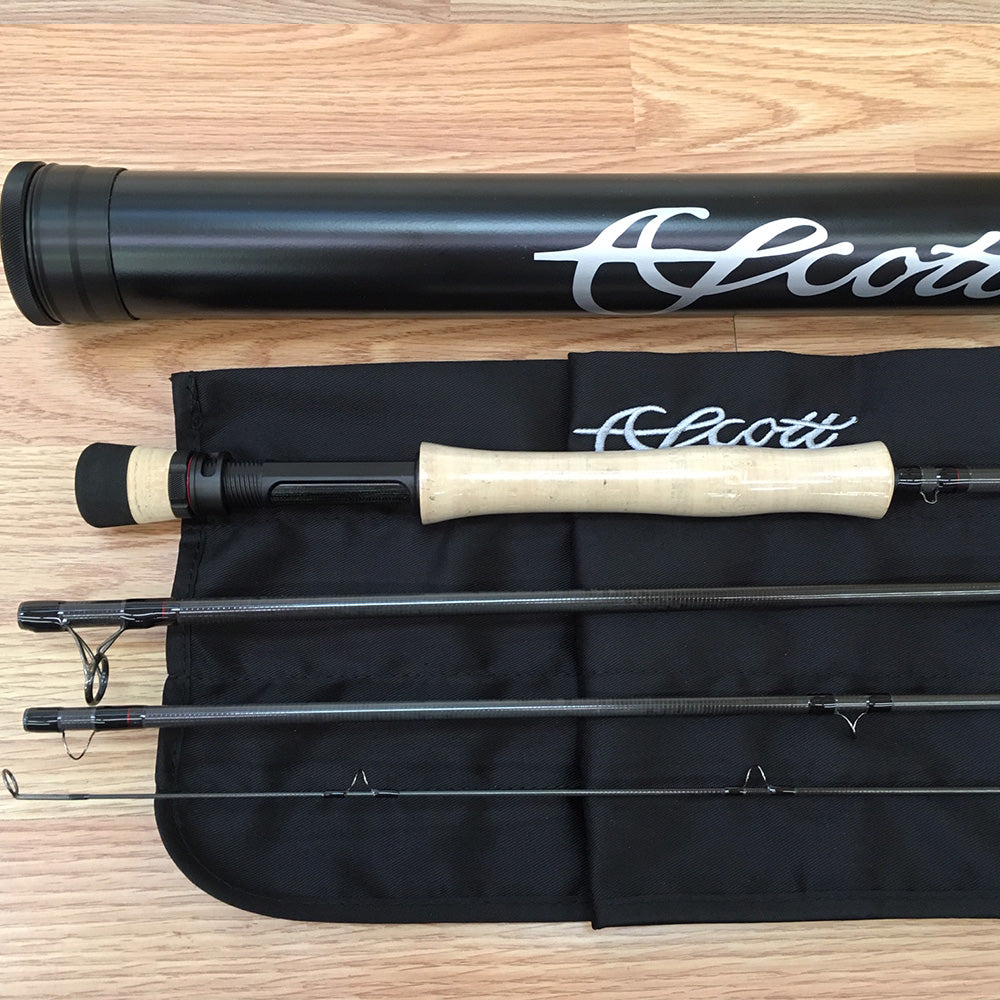 Scott Centric Fly Rod - 4 piece graphite fly rod with rod sock and aluminum case are shown in this image